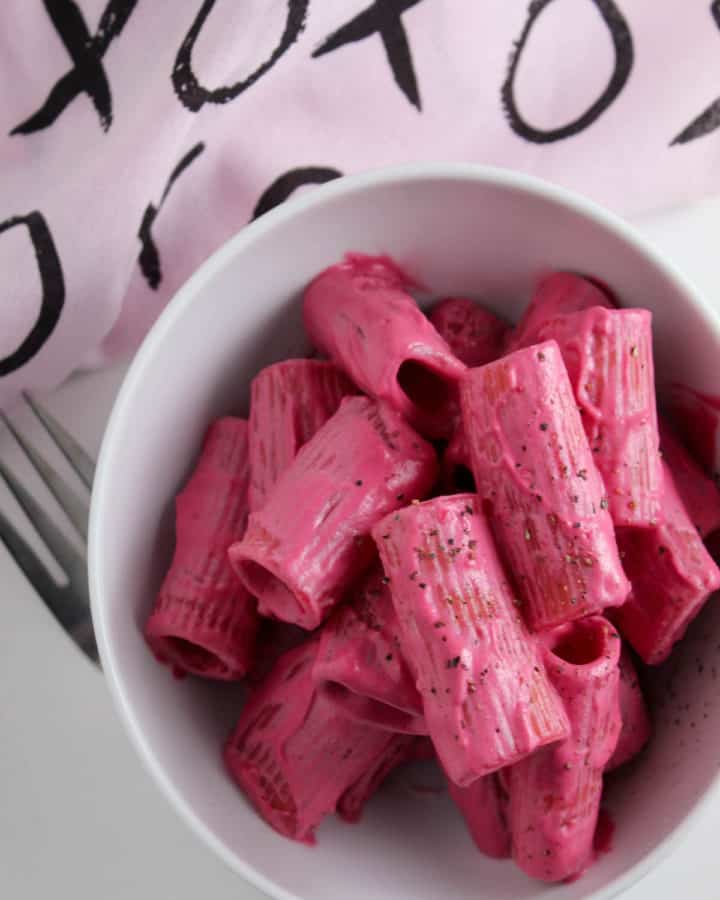 pink beet pasta in a bowl