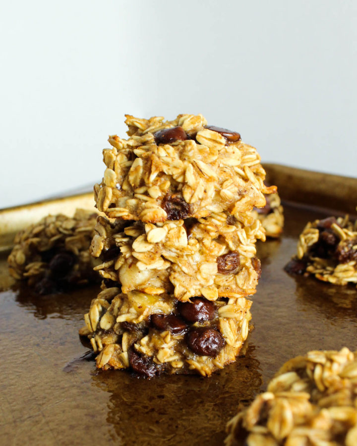 stack of 3 breakfast cookies on a baking sheet