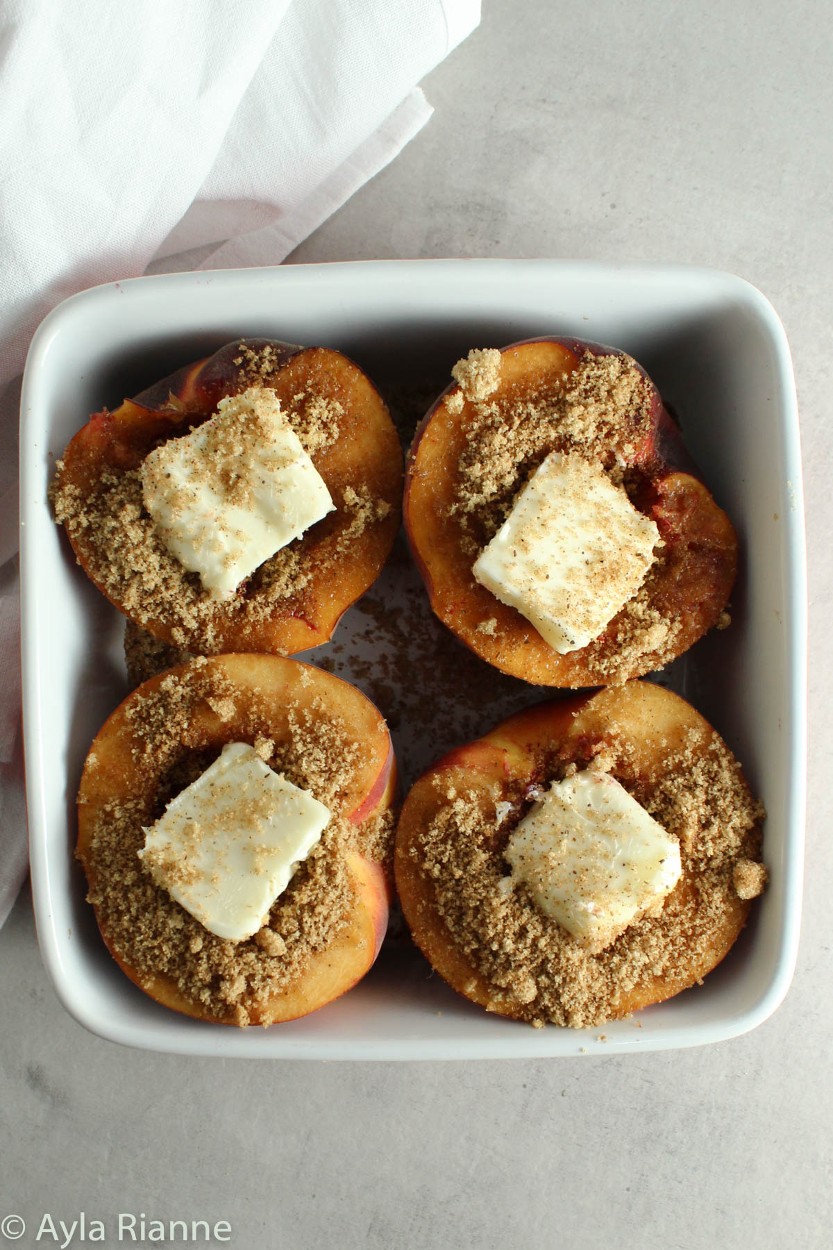 baked peaches in a baking dish