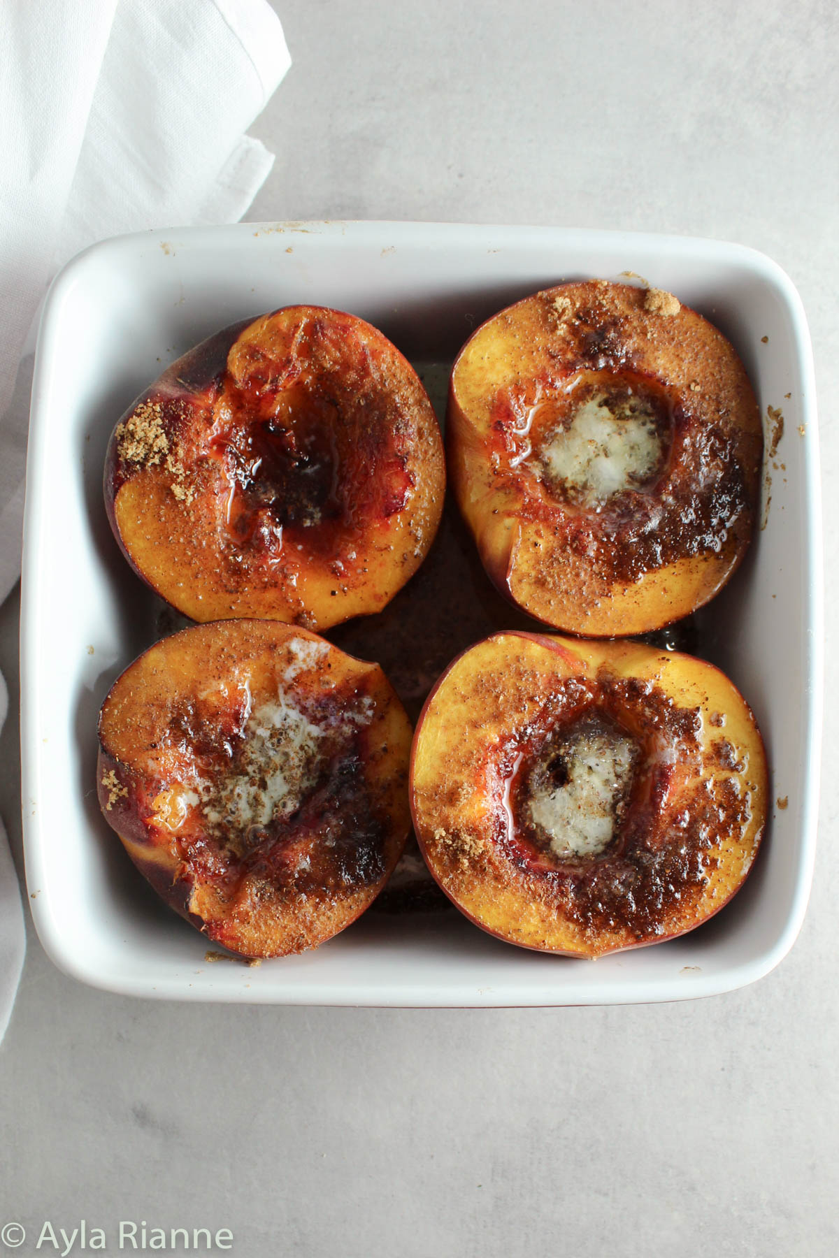 baked peaches in a baking dish