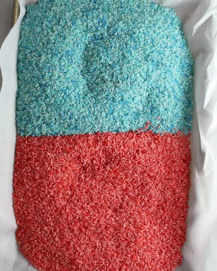 colored rice on a baking pan