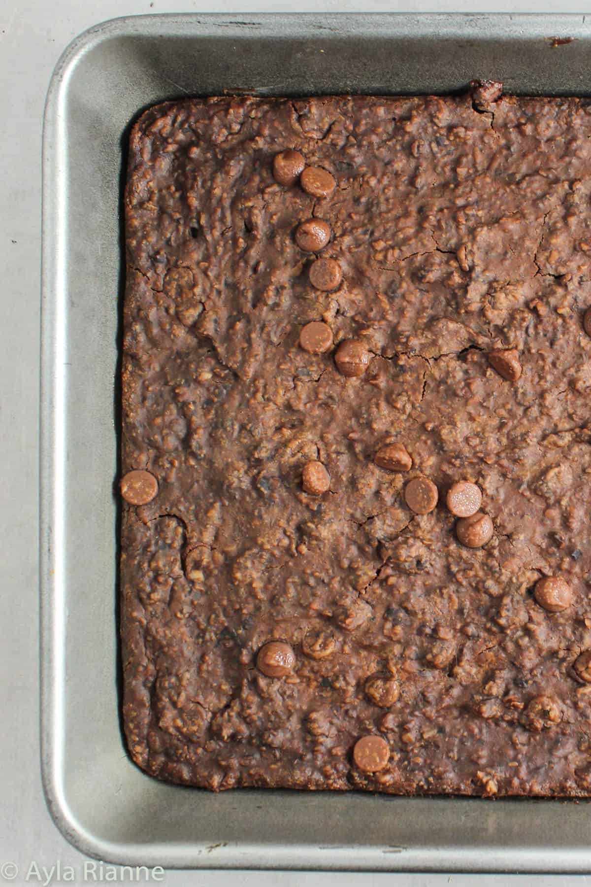 a close up of black bean brownies in a pan