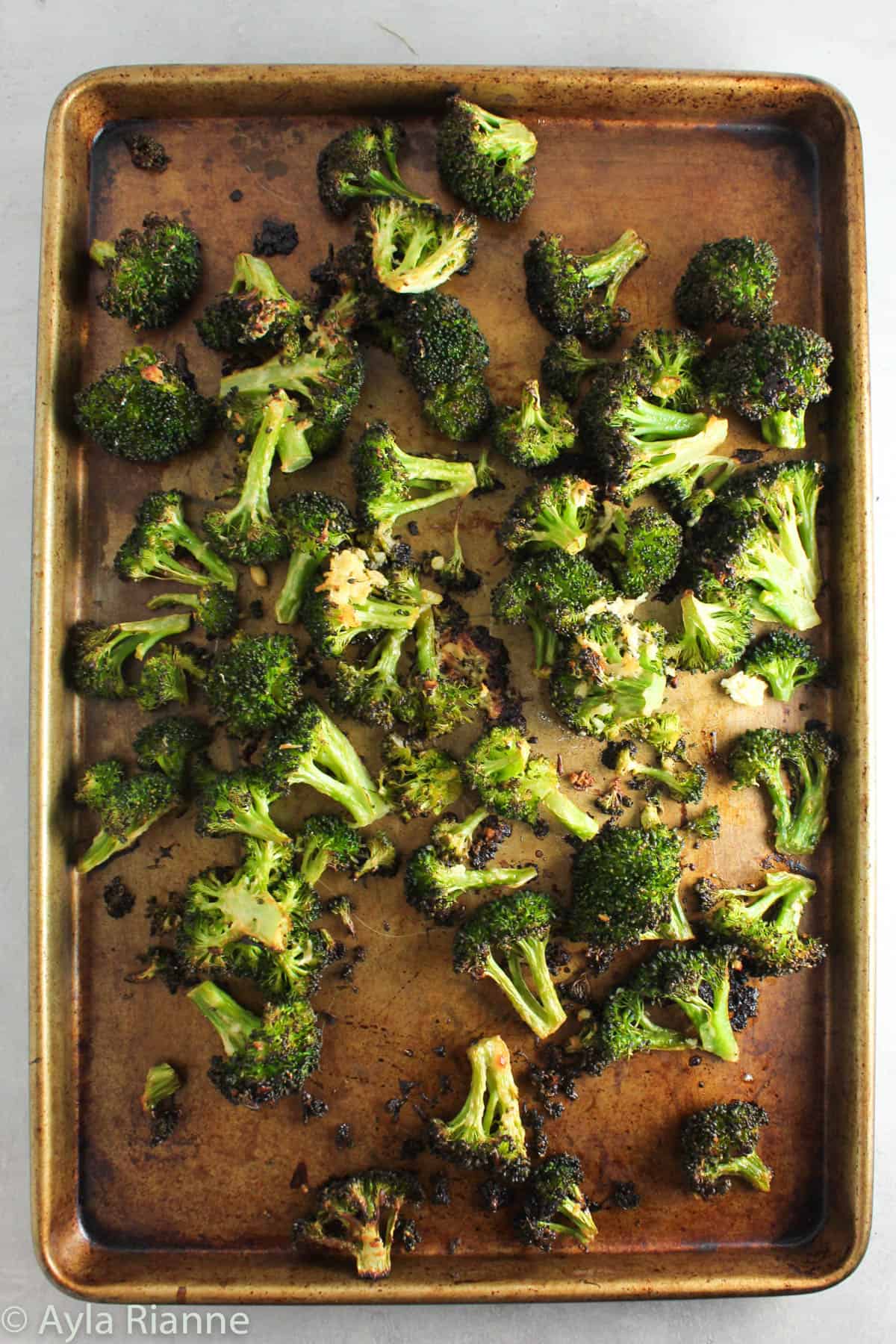 a baking sheet of roasted broccoli