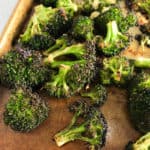 roasted broccoli on a baking pan