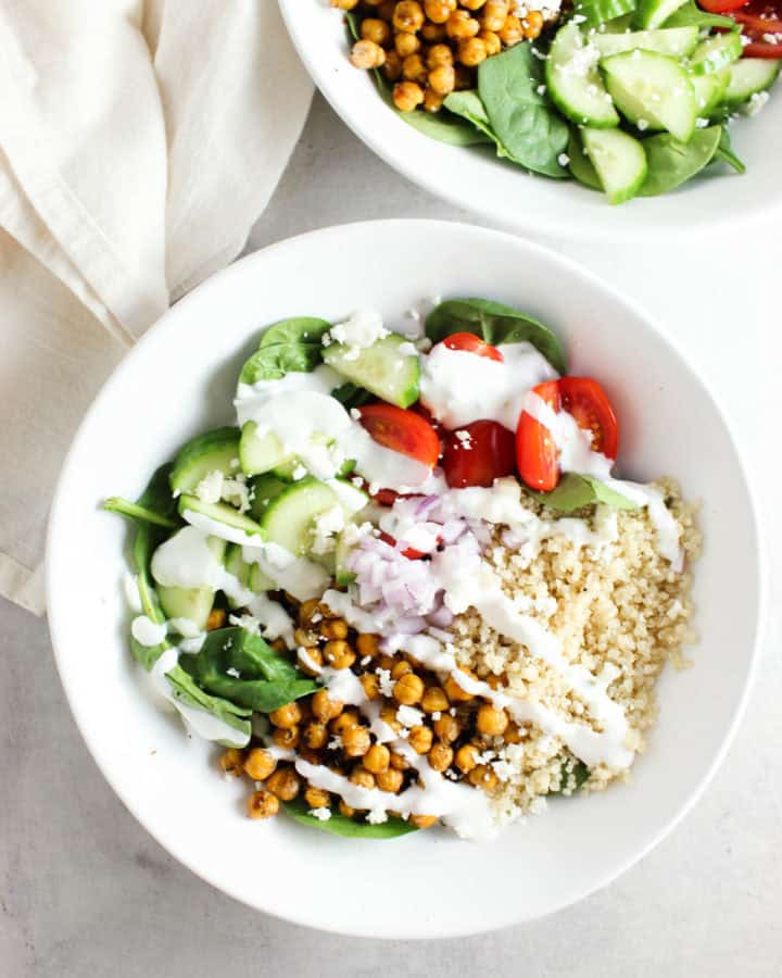 two mediterranean quinoa bowls