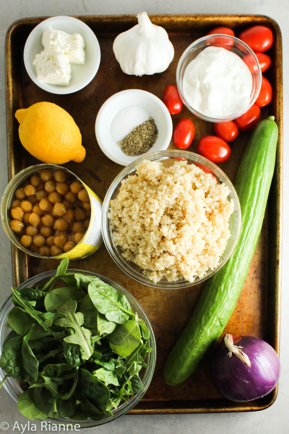 ingredients for a mediterranean quinoa bowl