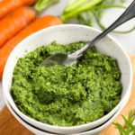plated Carrot Top Pesto with carrots beside it