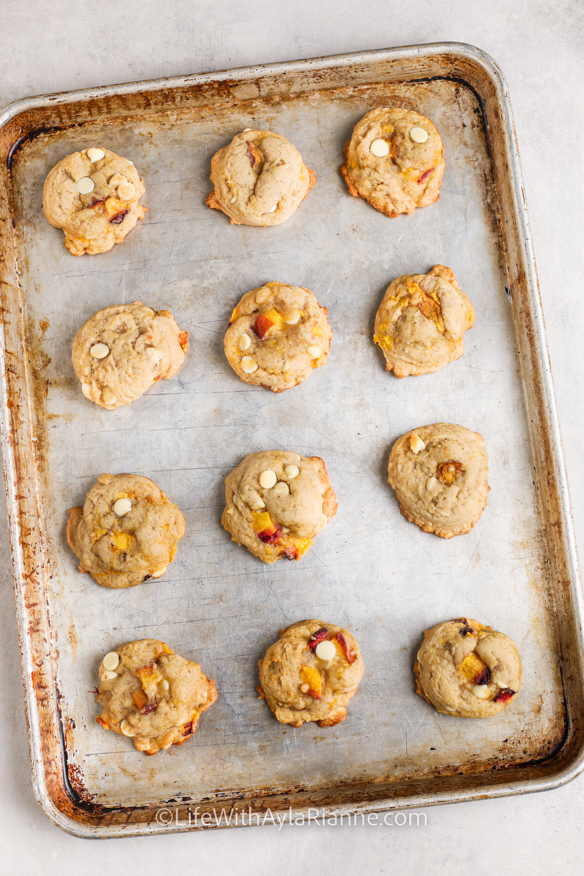 baked Peach Cobbler Cookies on a sheet pan