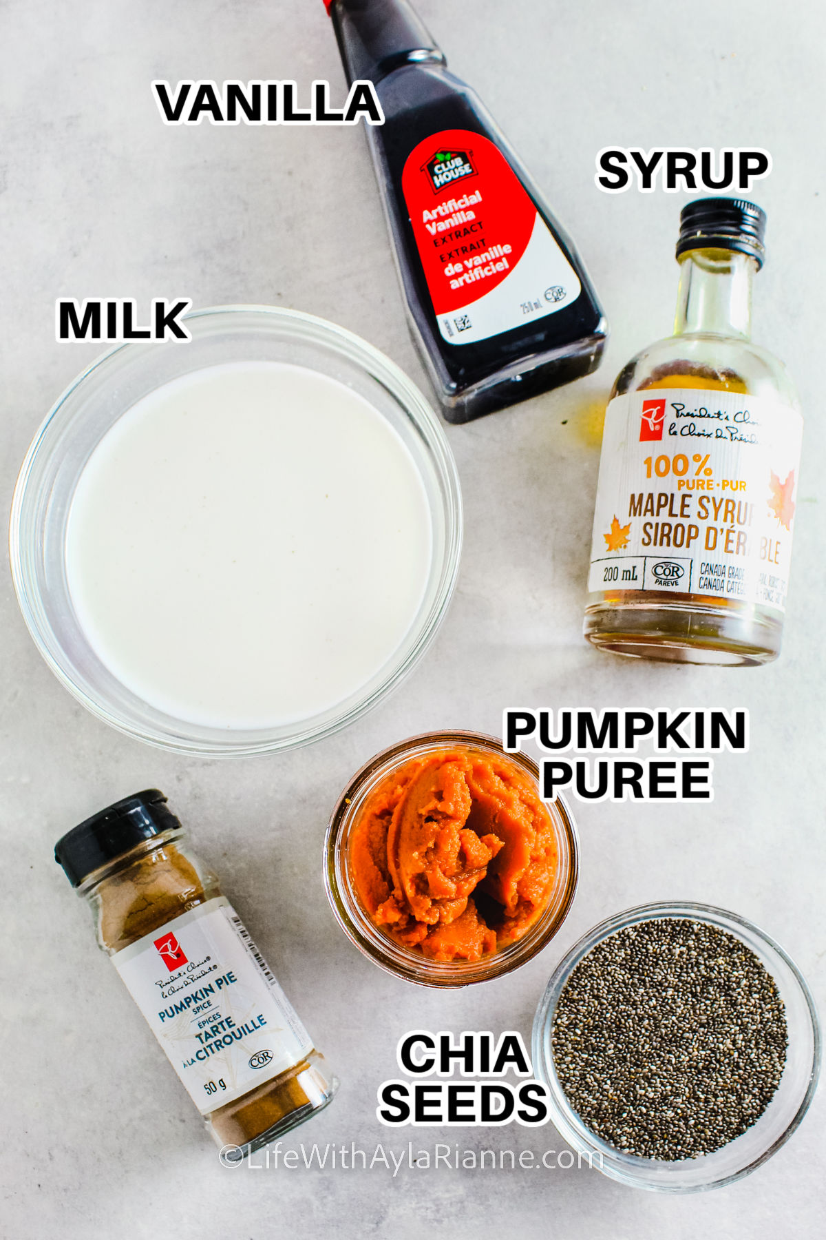 vanilla , milk , syrup , pumpkin puree , chia seeds with labels to make Pumpkin Chia Pudding