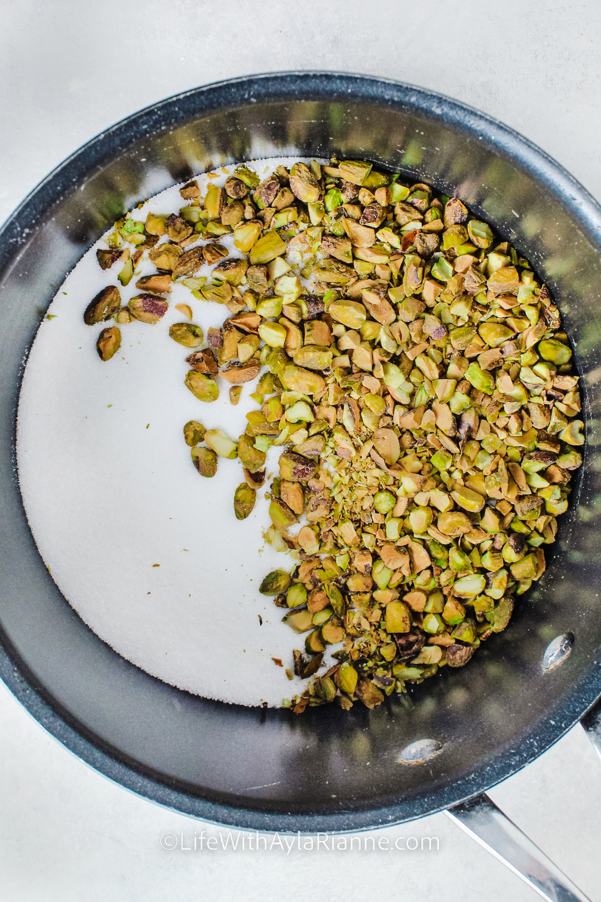 ingredients to make Pistachio Syrup in a pot