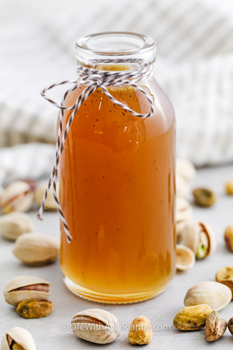 Pistachio Syrup in a jar with a ribbon