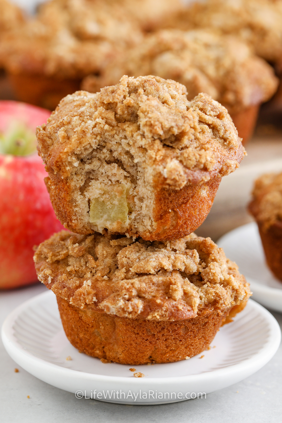Apple Cinnamon Muffins with a bite taken out of one