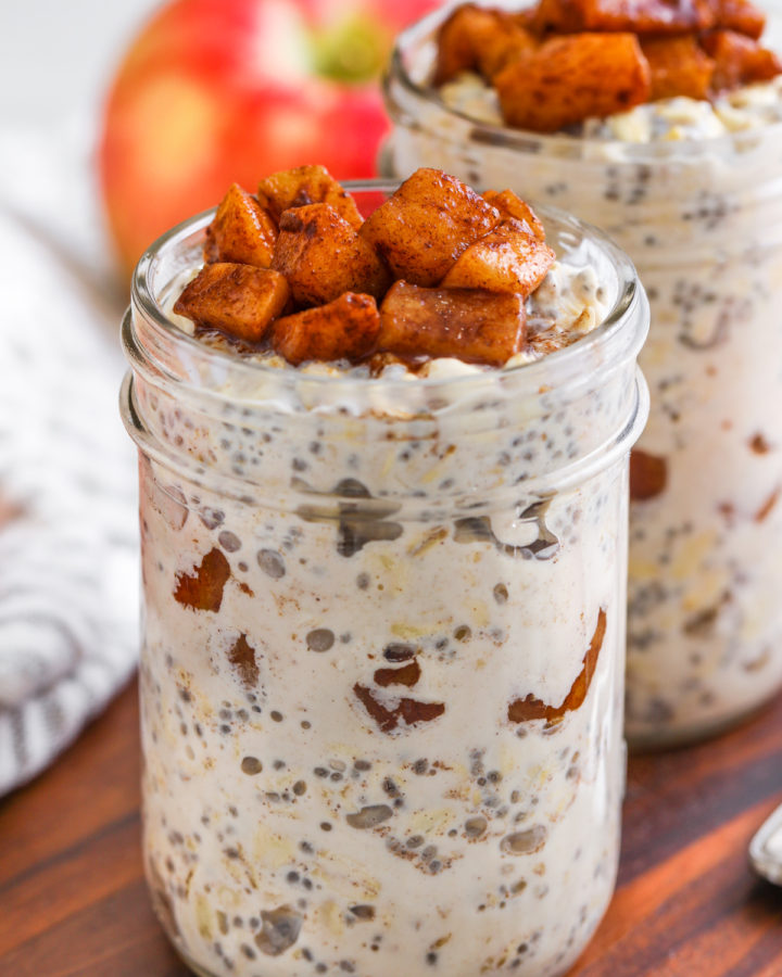 two glass jars of apple pie overnight oats