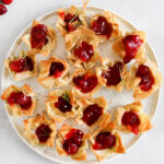 Brie Cranberry Bites on a white serving place