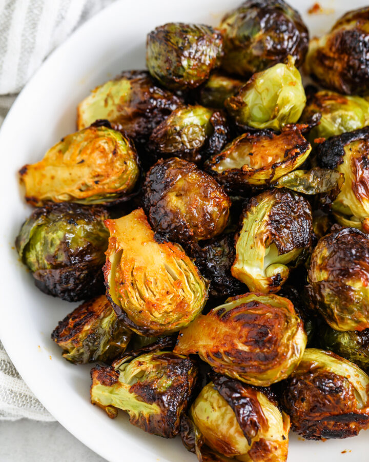 cooked Honey Sriracha Brussels Sprouts on a plate