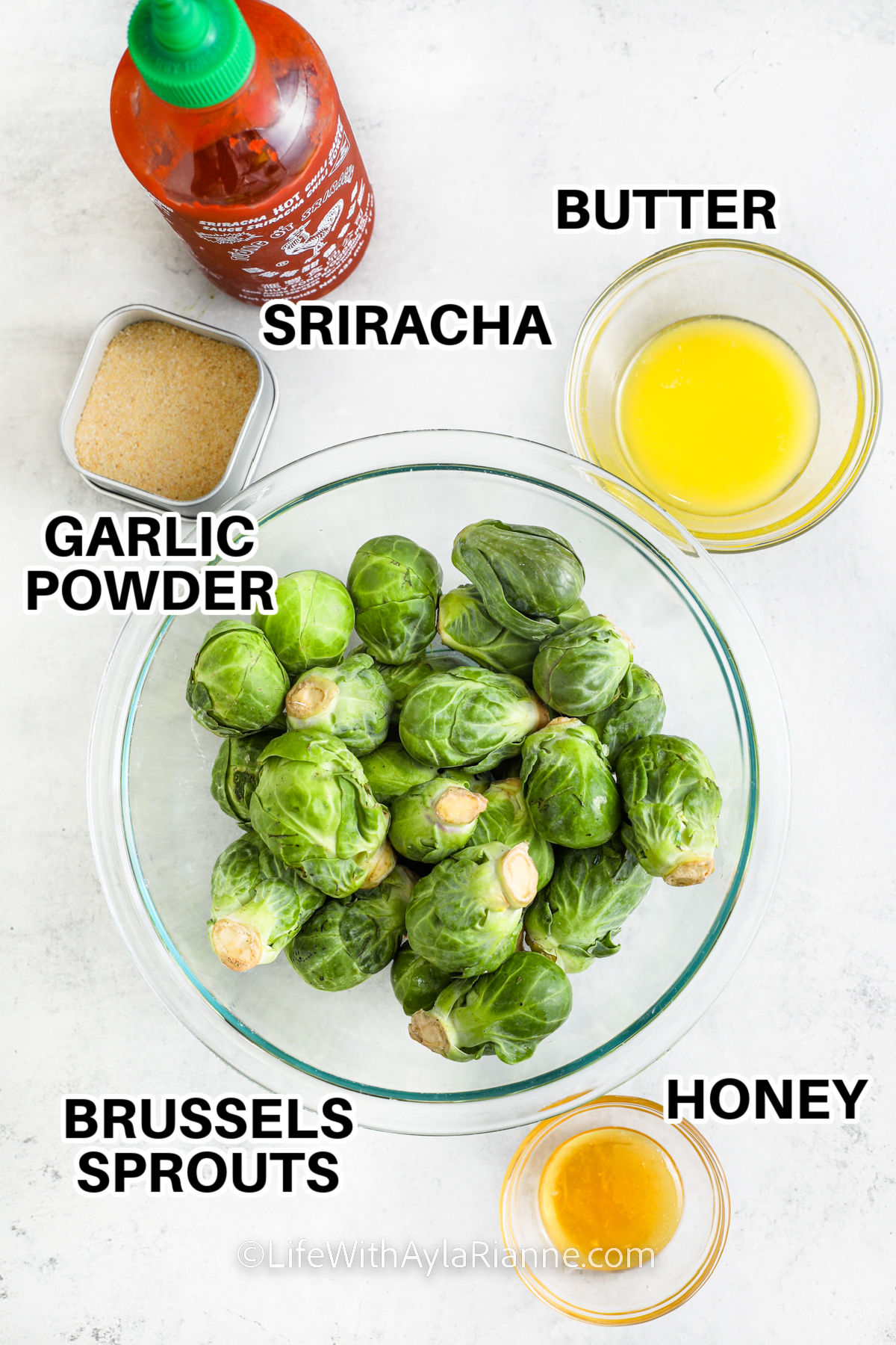 sriracha , butter , garlic powder , brussels sprouts and honey with labels to make Honey Sriracha Brussels Sprouts