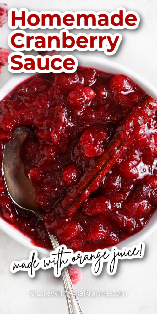 cranberry sauce with orange juice in a white bowl with writing