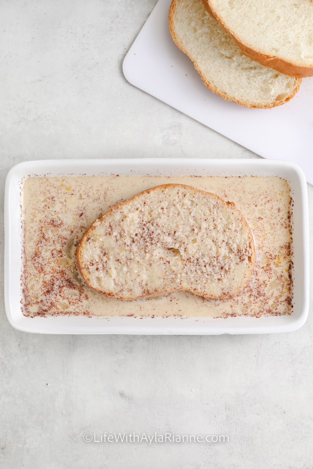 soaking bread in an eggnog & egg mixture for Eggnog French Toast