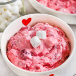 easy Raspberry Fluff Salad in a decorated heart bowl