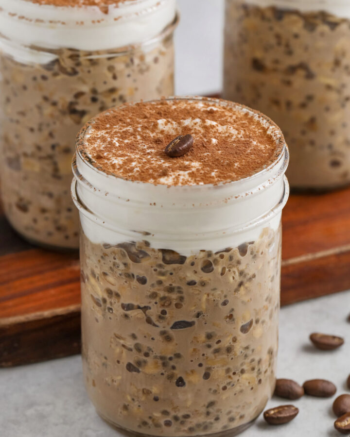 jars of Tiramisu Overnight Oats with coffee bean on top