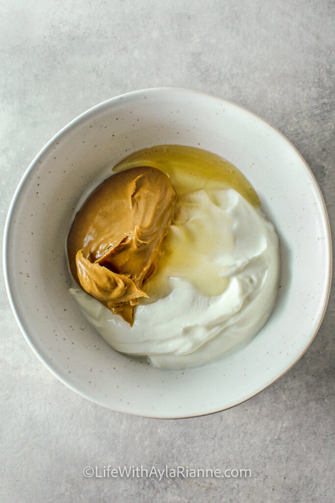 yogurt, peanut butter, and honey in a bowl
