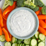 Dill Veggie Dip with carrots , broccoli , cucumbers and peppers