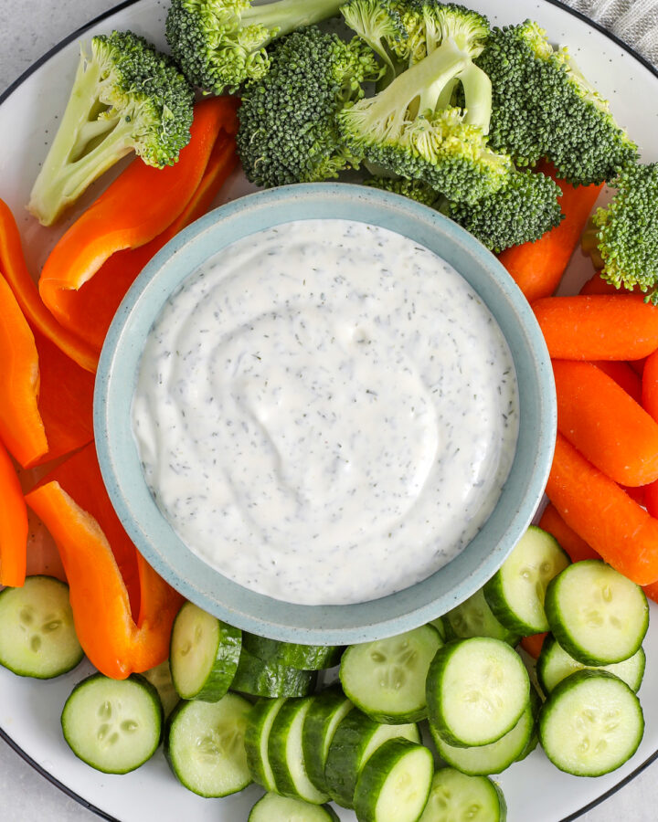 Dill Veggie Dip with carrots , broccoli , cucumbers and peppers