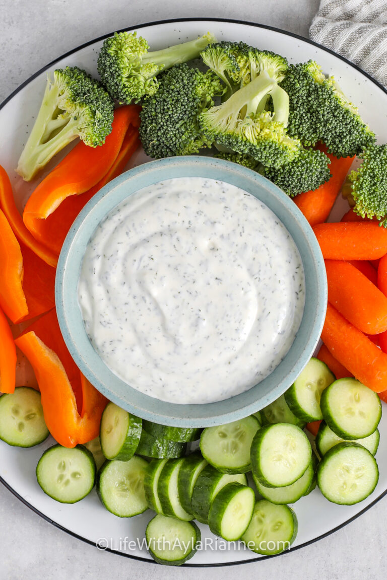 Dill Veggie Dip with carrots , broccoli , cucumbers and peppers