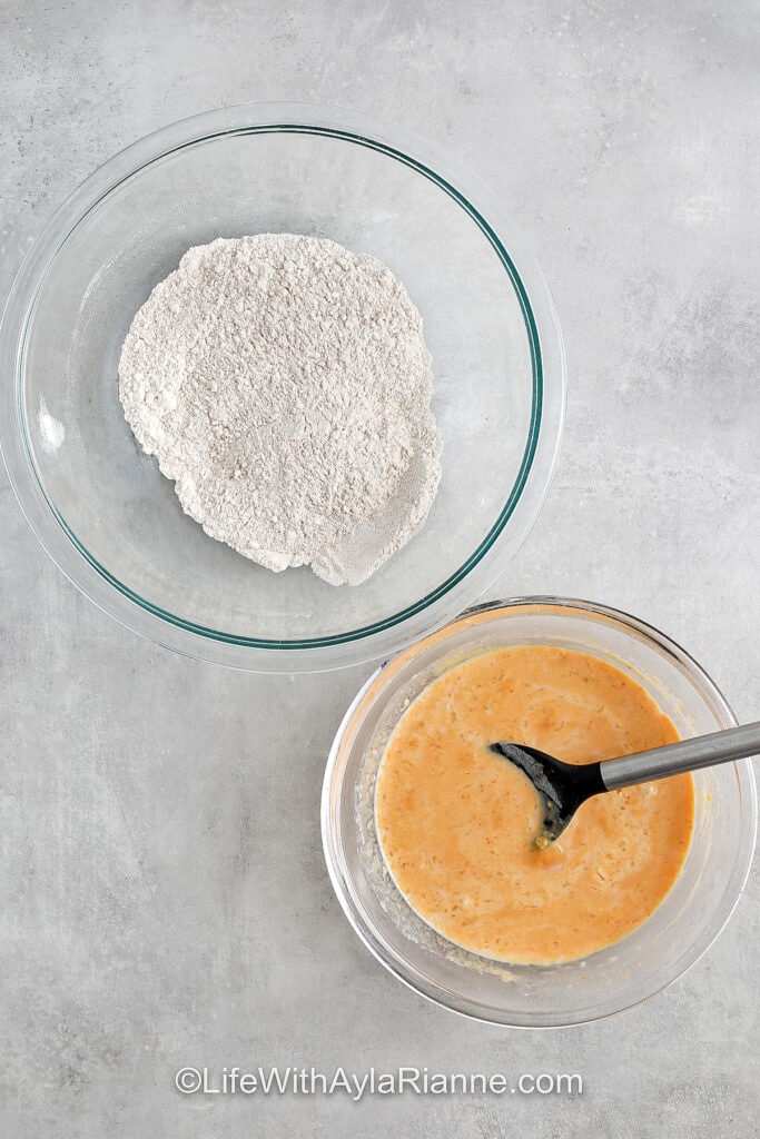 dry and wet ingredients in bowls to make Fluffy Pumpkin Pancakes