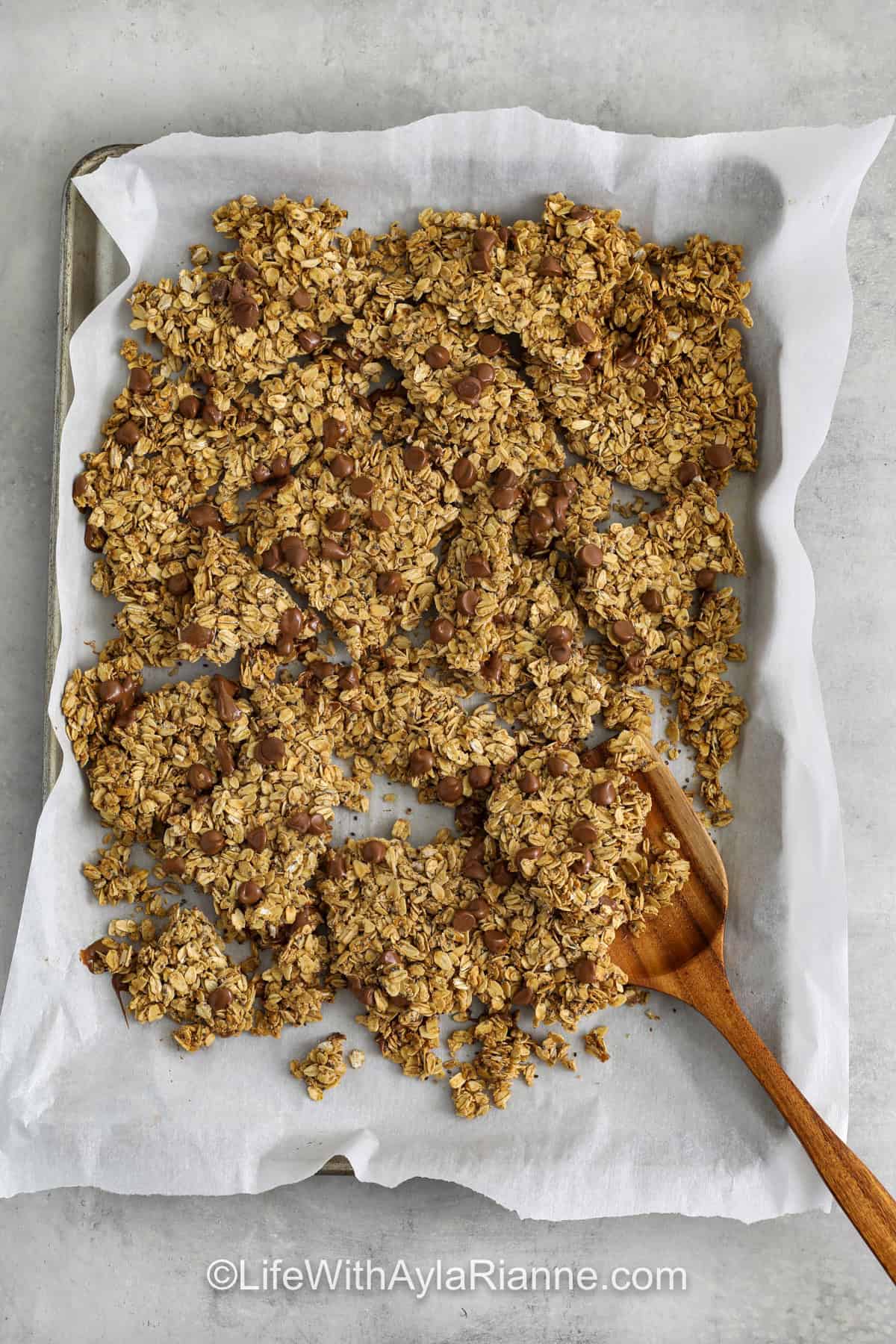 top view of Chocolate Chip Cookie Granola on a sheet pan